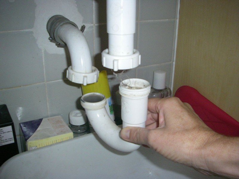 Clean Bathroom Sink Drain Pipe