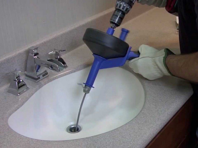 Unclogging Bathroom Sink Drain Auger